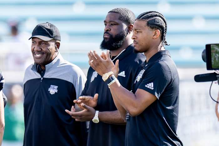 James "Shack" Harris with Terron Armstead and Jameis Winston.